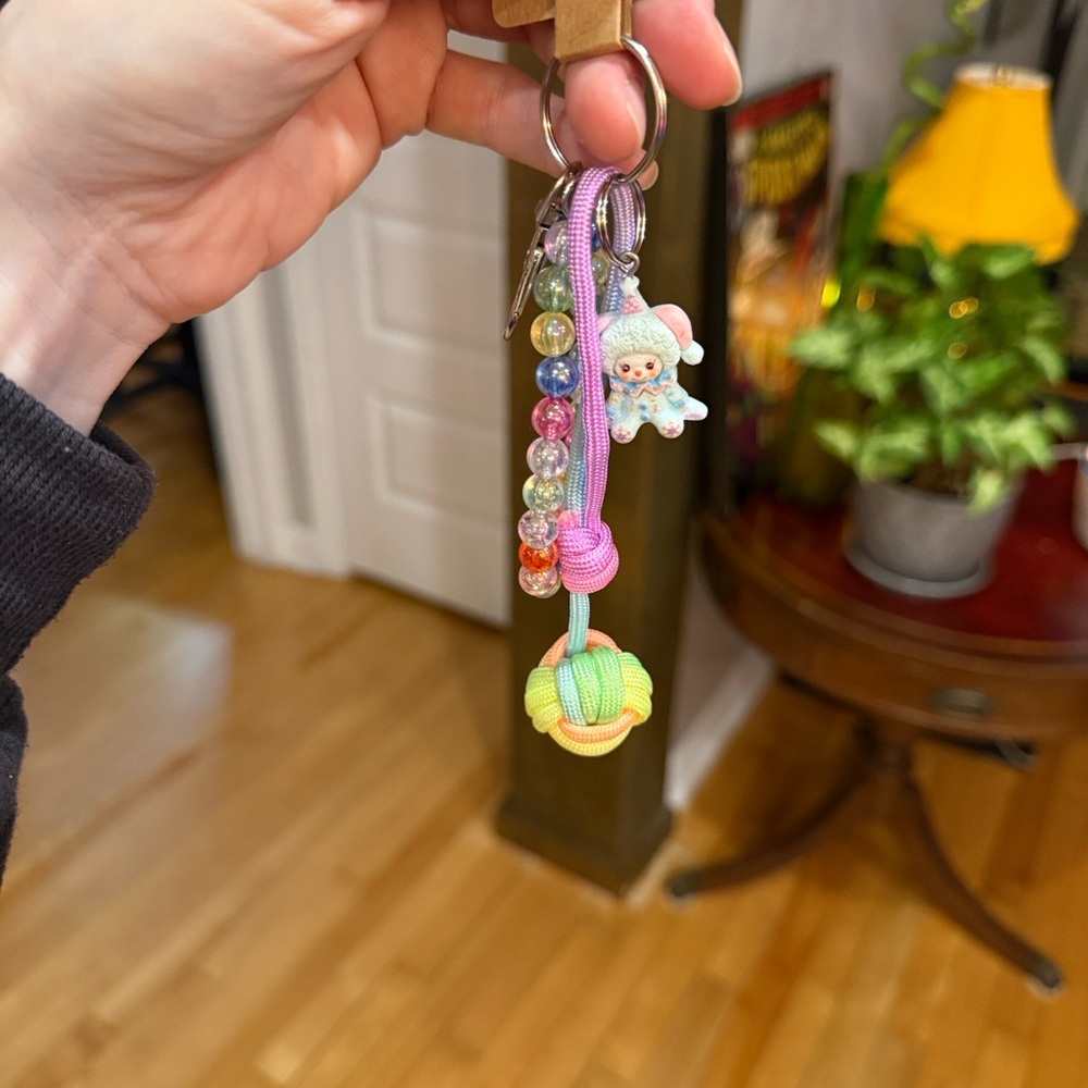 Handmade Colorful Beaded Keychain with clown Charm and monkeys fist